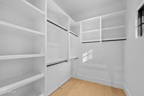 a bathroom with a toilet and shower