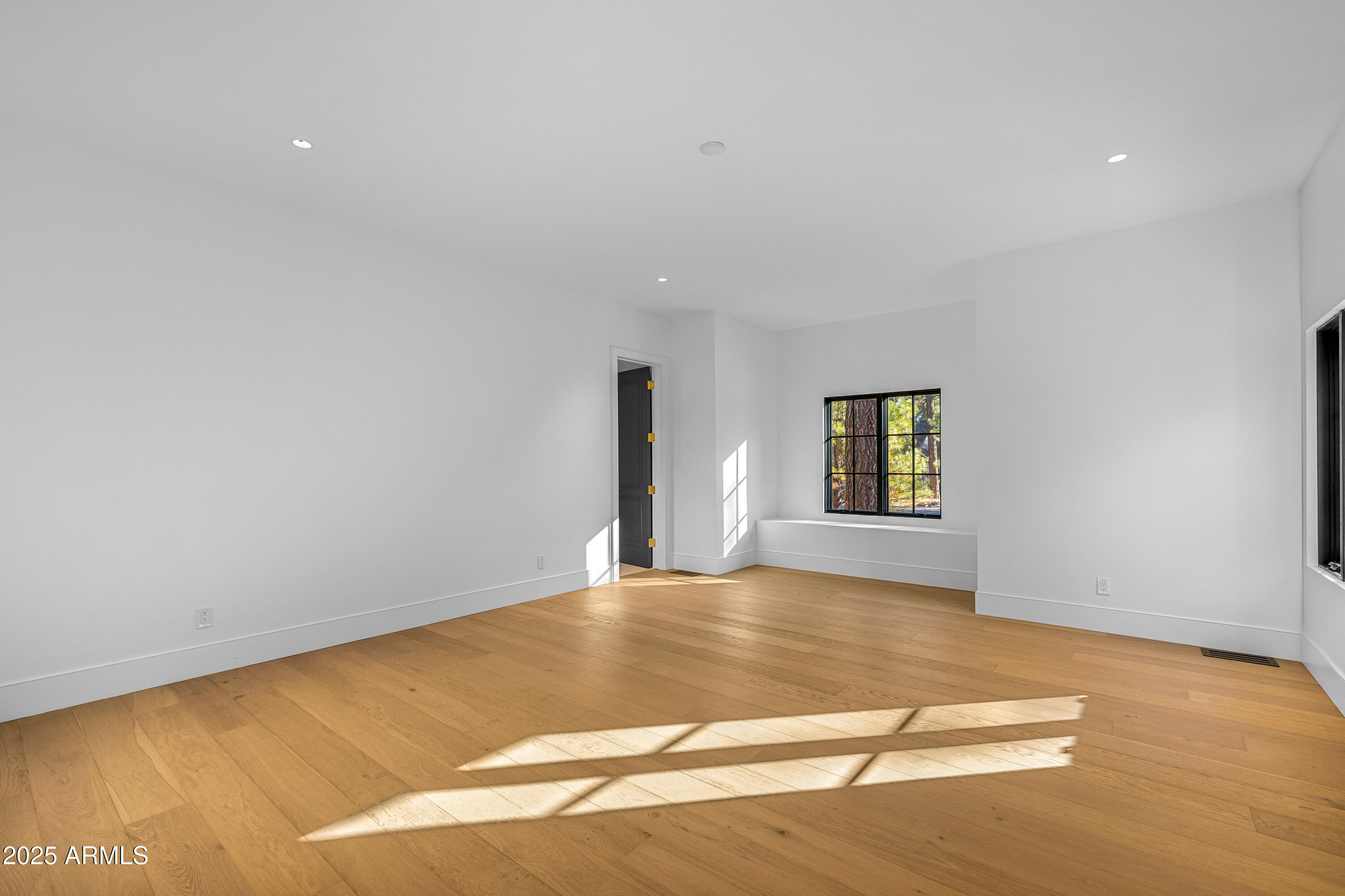 2732 Lindberg Spring Flagstaff, AZ 86005 - Photo 32 of 56 a view of an empty room with a window