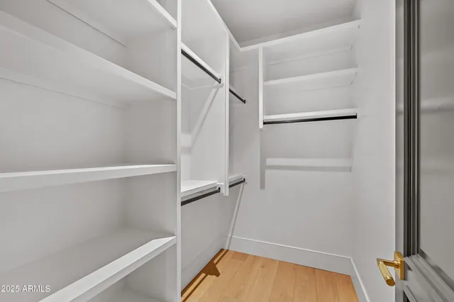 a view of empty room with windows