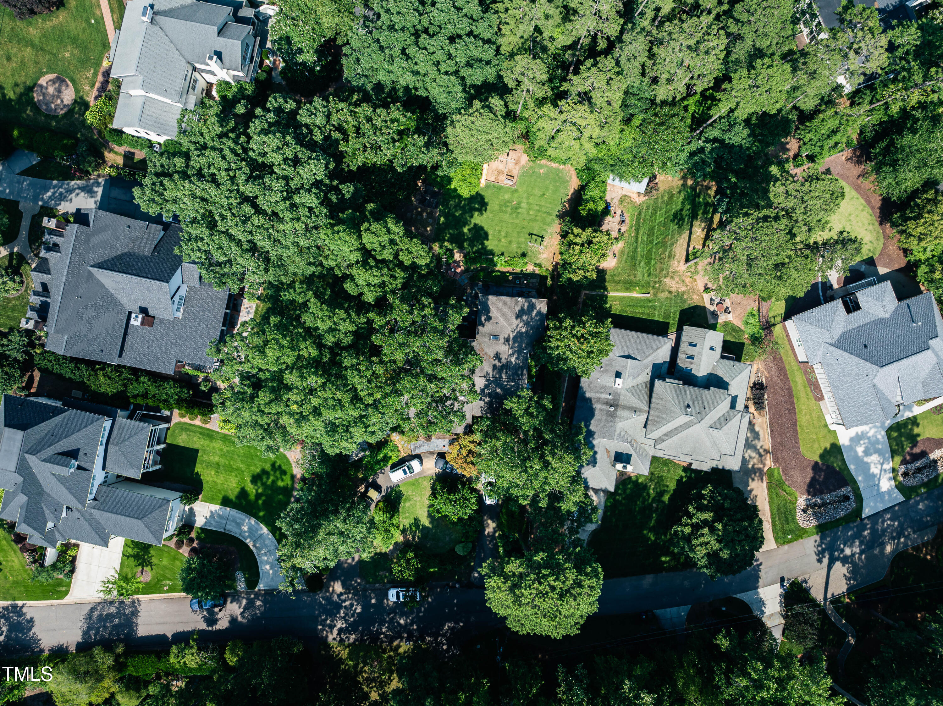 2112 St James Road Raleigh, NC 27607 - Photo 3 of 5 an aerial view of a house with a yard