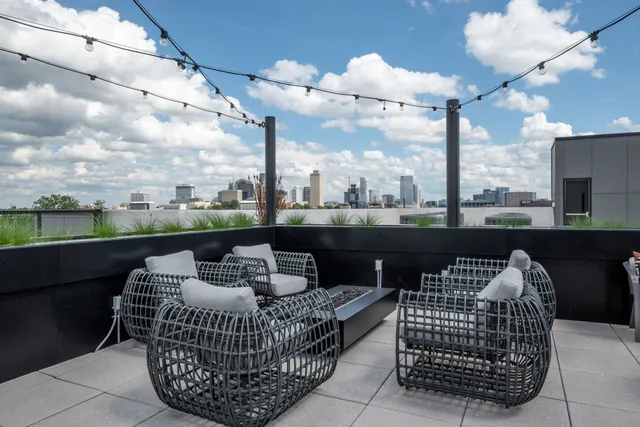 a view of a terrace with sitting area