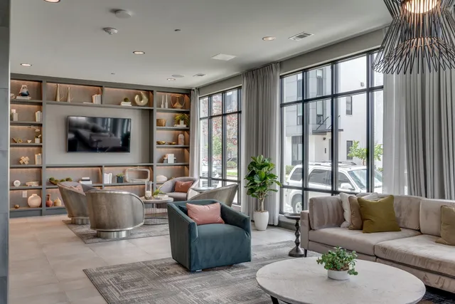 a view of a door and a potted plant
