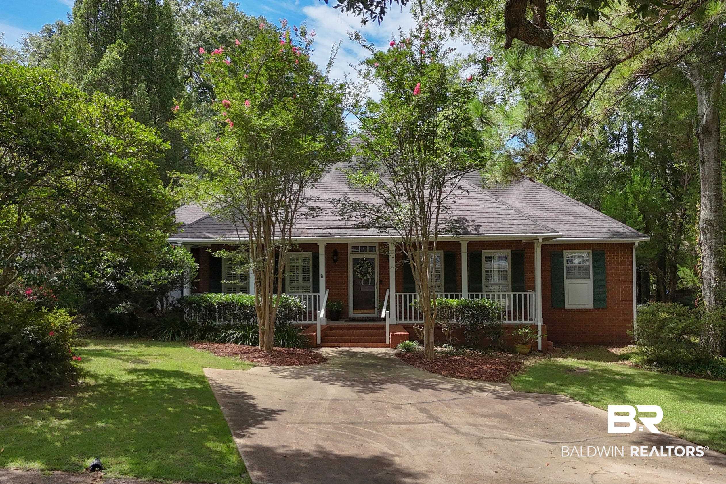 6638 Jackson Square Daphne, AL 36526 - Photo 42 of 62 View of front of property with a porch and a front lawn