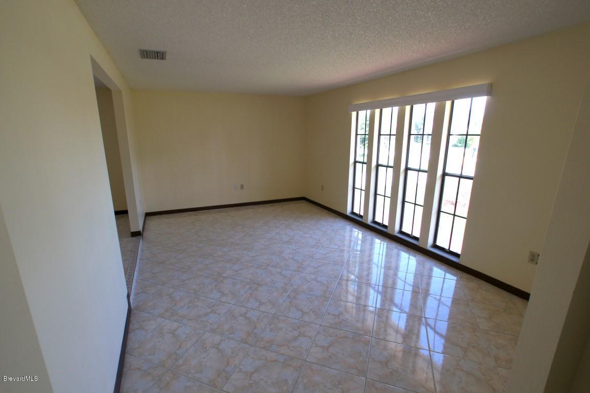 475 Rio Vista Lane Merritt Island, FL 32952 - Photo 7 of 14 Rio Vista 475 - Formal Living