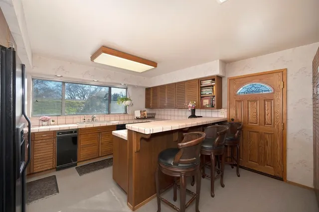 a bathroom with a toilet and a sink