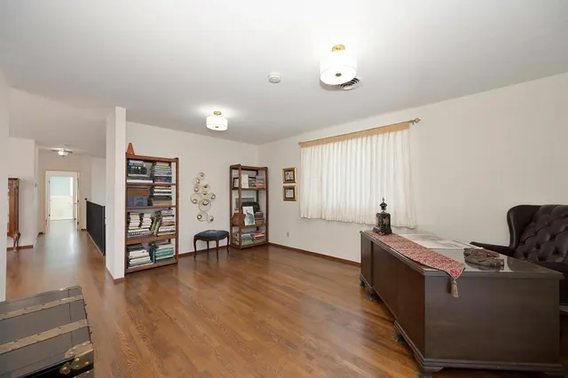 a bathroom with a tub and a shower