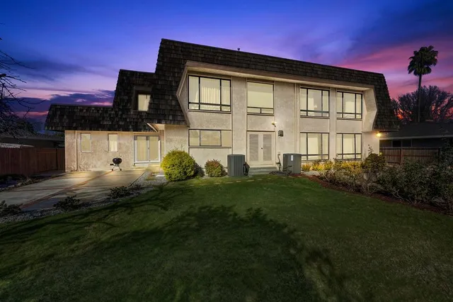 a view of a lake in middle of the forest