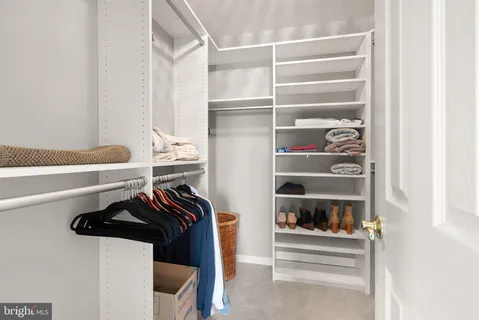 a workspace with furniture and a window