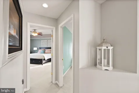 a view of a livingroom with a ceiling fan