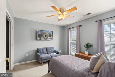 a kitchen with granite countertop a sink and cabinets