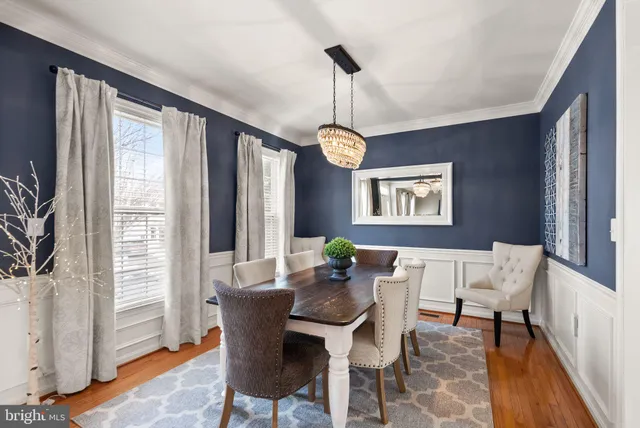 an aerial view of residential building with parking