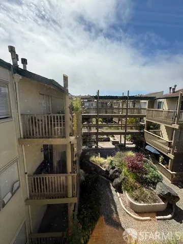 a view of a chairs and table in the terrace