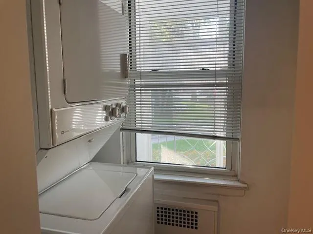 a view of kitchen and wooden floor