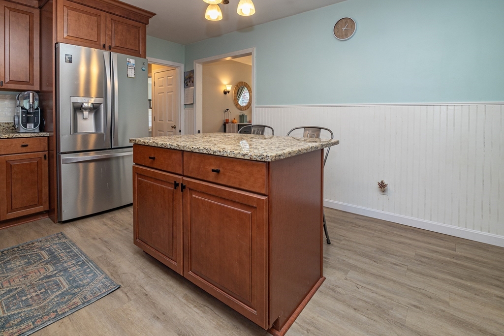 220 West Main Street Dudley, MA 01571 - Photo 16 of 42 a kitchen with stainless steel appliances granite countertop a refrigerator a sink and a stove