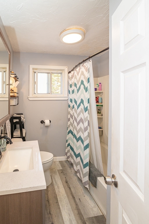 220 West Main Street Dudley, MA 01571 - Photo 17 of 42 a bathroom with a sink toilet and shower