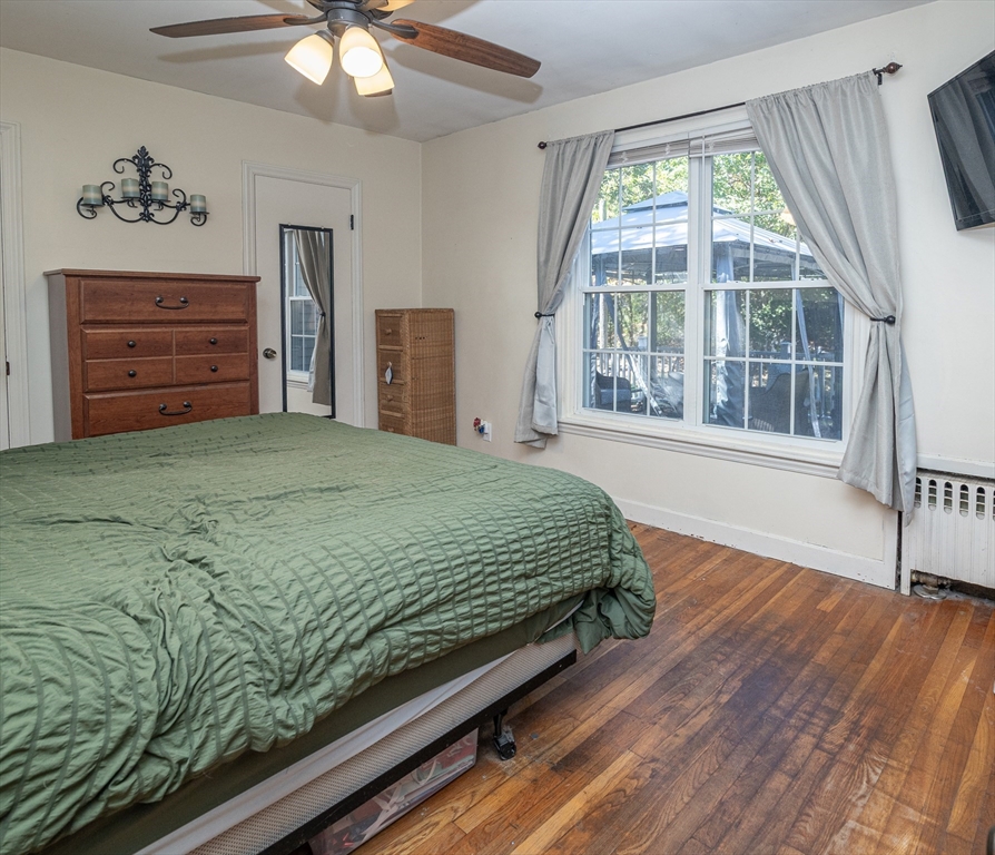 220 West Main Street Dudley, MA 01571 - Photo 19 of 42 a bedroom with a bed and a window
