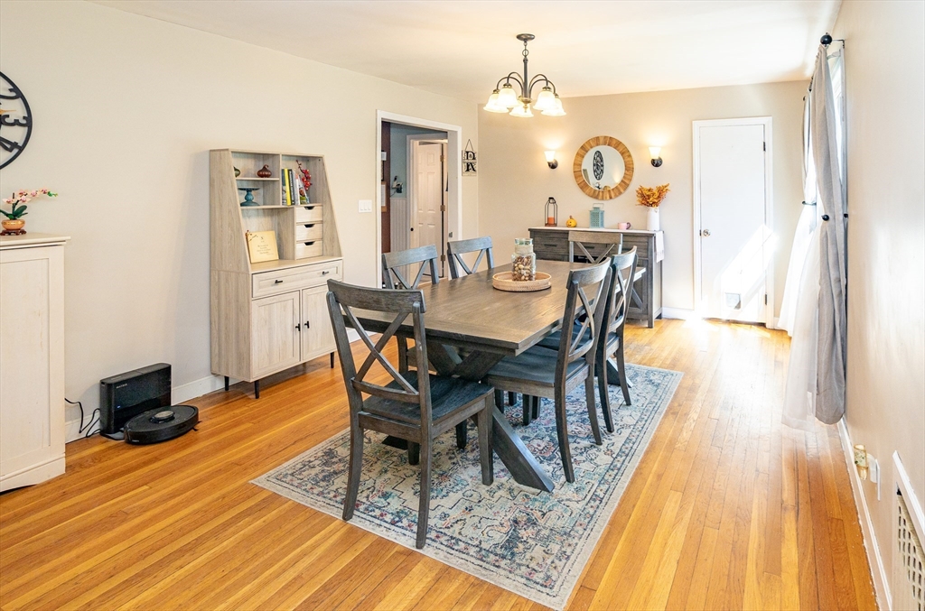 220 West Main Street Dudley, MA 01571 - Photo 9 of 42 a view of a dining room with furniture and wooden floor