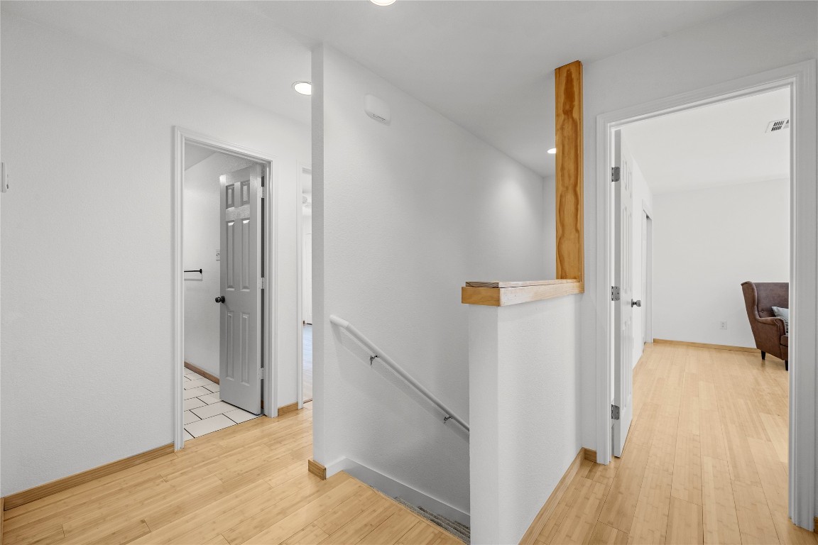 504 Tyree Road Cedar Park, TX 78613 - Photo 13 of 35 Hallway featuring an upstairs landing, l