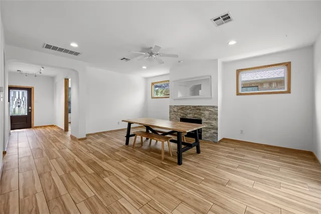 a view of a livingroom with furniture and wooden floor