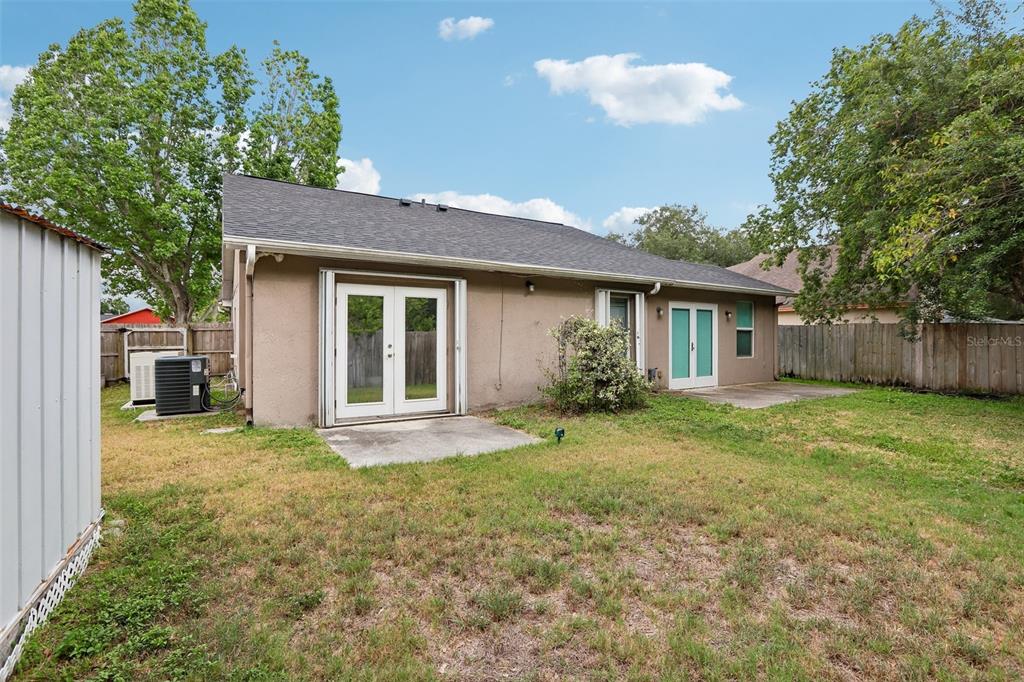 1525 Kestrel Way Brandon, FL 33511 - Photo 45 of 48 a house view with a garden space