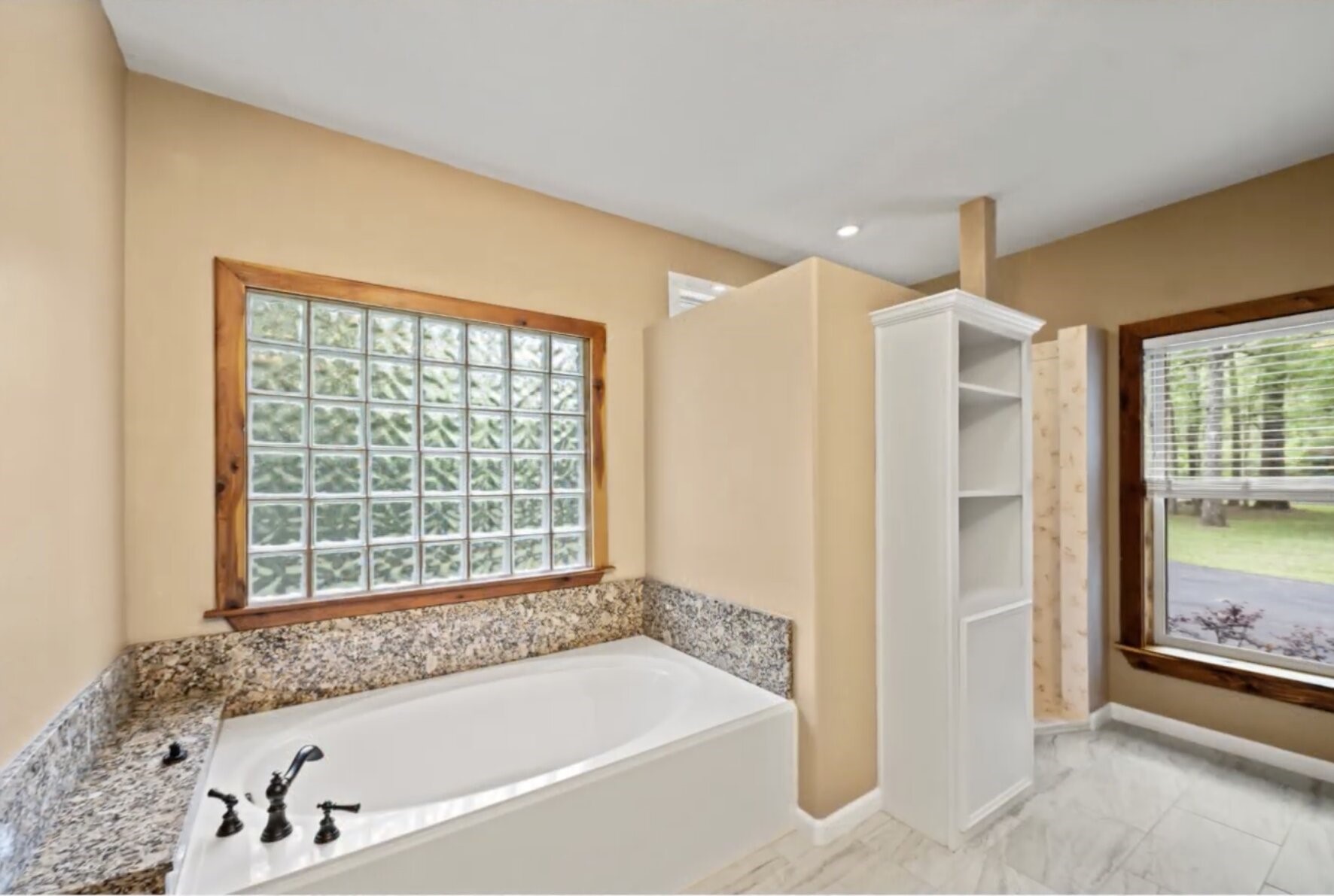 30338 Riley Road Waller, TX 77484 - Photo 24 of 46 a bathroom with a bathtub and a shower