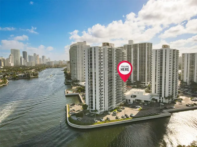 a view of a swimming pool with a lounge chair