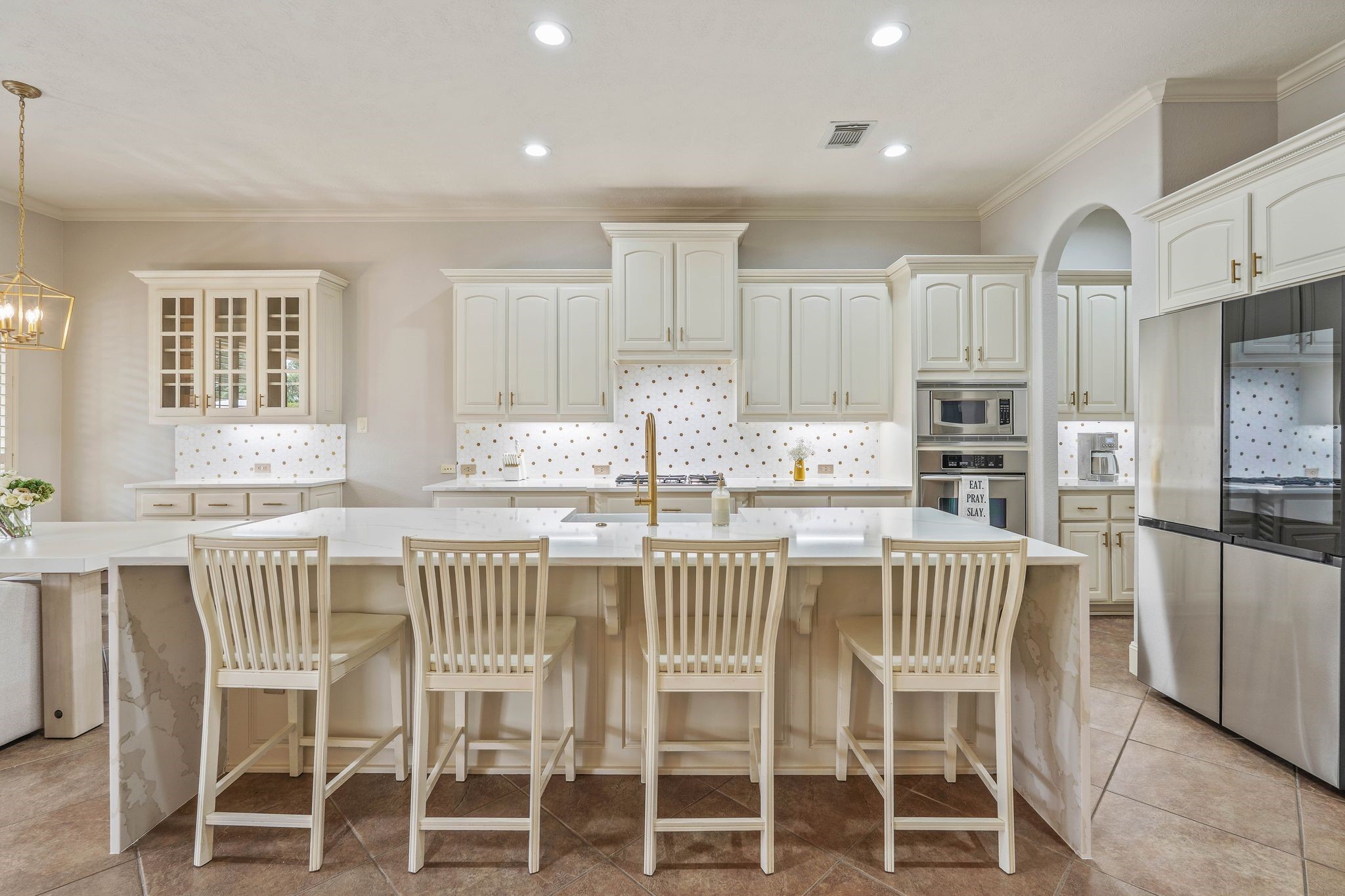 7603 Hogan Bridge Court Spring, TX 77389 - Photo 19 of 49 a view of a dining room with furniture and wooden floor