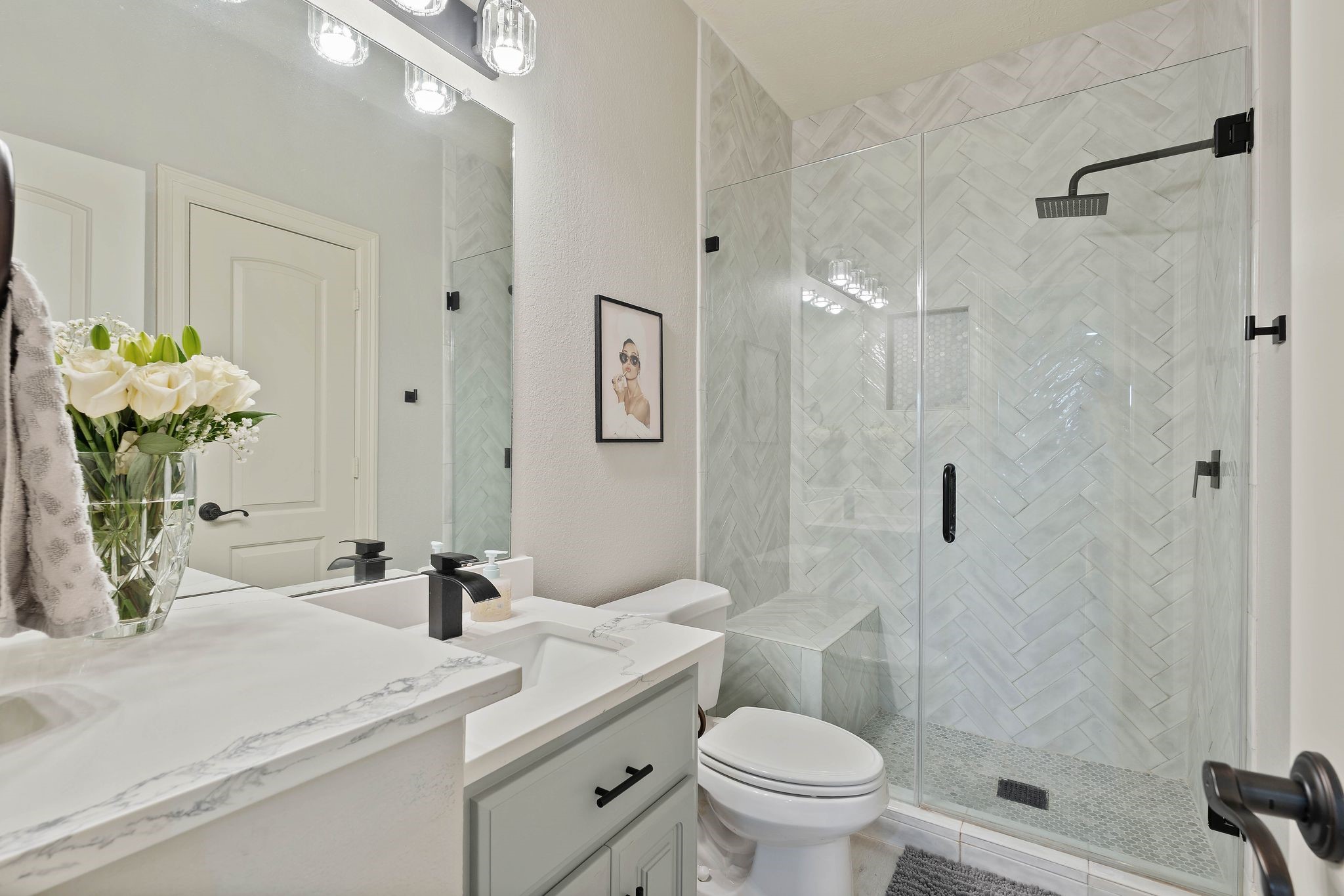 7603 Hogan Bridge Court Spring, TX 77389 - Photo 29 of 49 a bathroom with a sink a toilet and shower