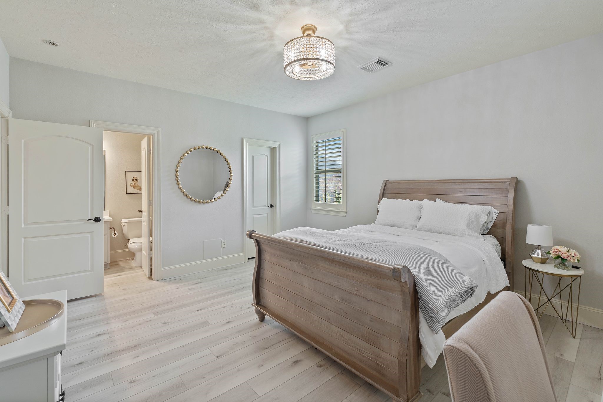 7603 Hogan Bridge Court Spring, TX 77389 - Photo 31 of 49 a bedroom with a bed and window