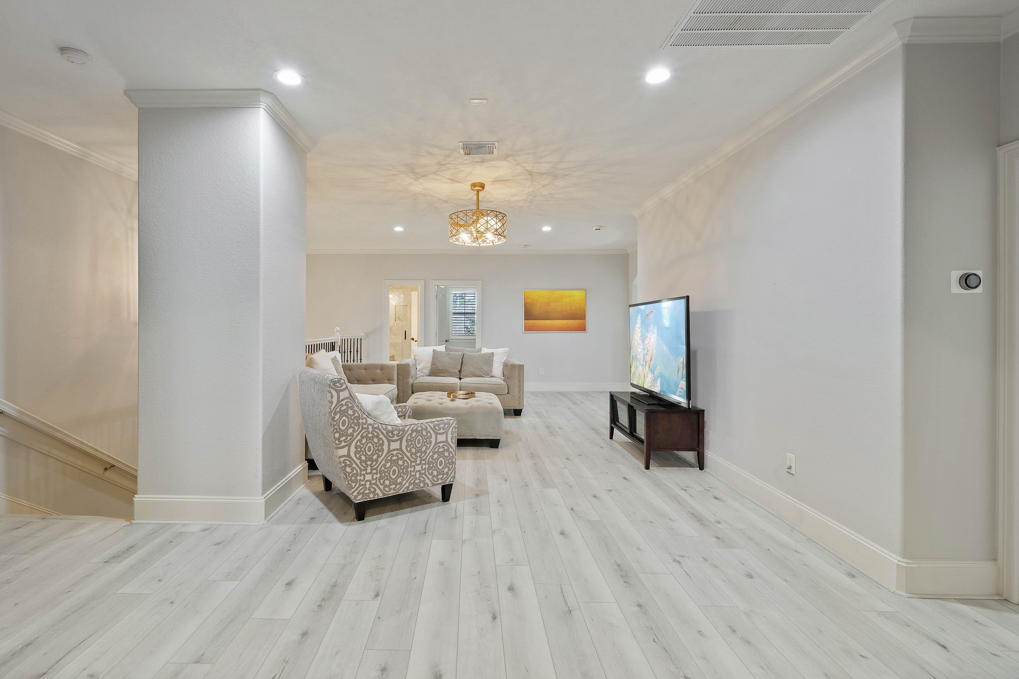 7603 Hogan Bridge Court Spring, TX 77389 - Photo 36 of 49 a living room with furniture and a wooden floor