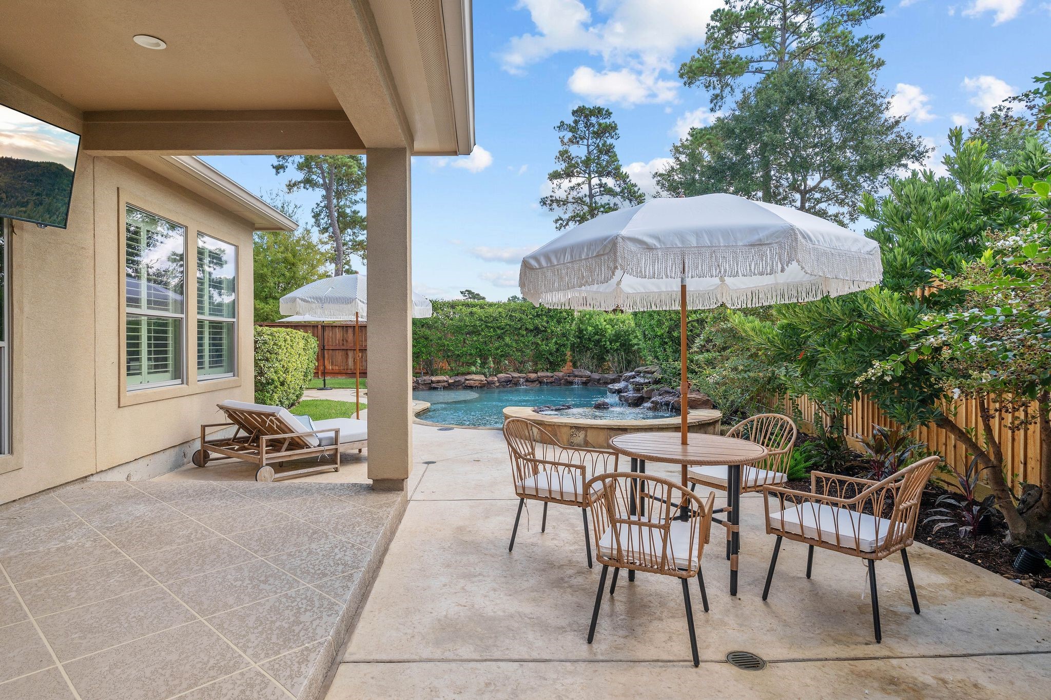 7603 Hogan Bridge Court Spring, TX 77389 - Photo 40 of 49 a patio with a patio table and chairs