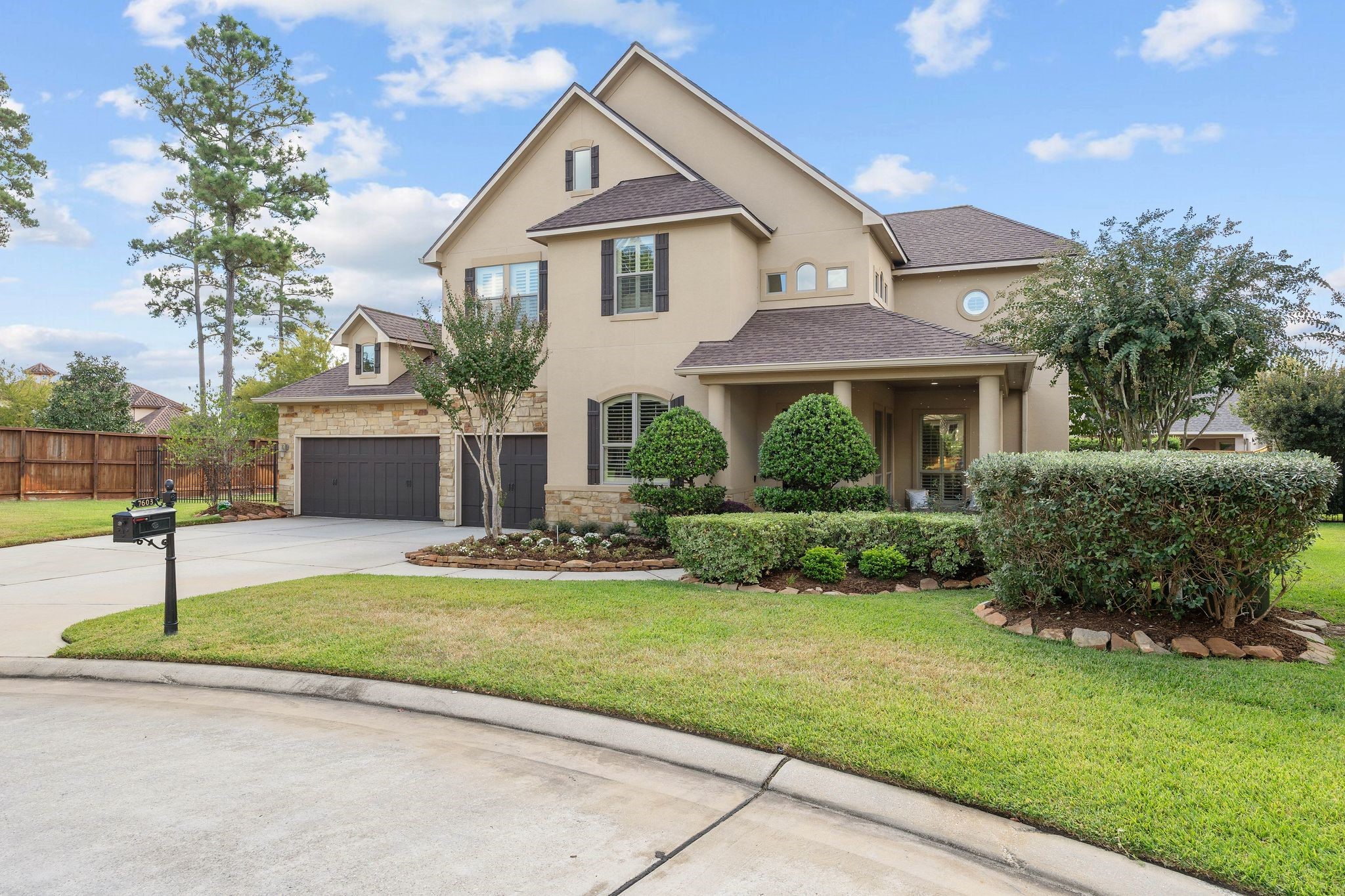 7603 Hogan Bridge Court Spring, TX 77389 - Photo 4 of 49 a front view of a house with a yard and garage