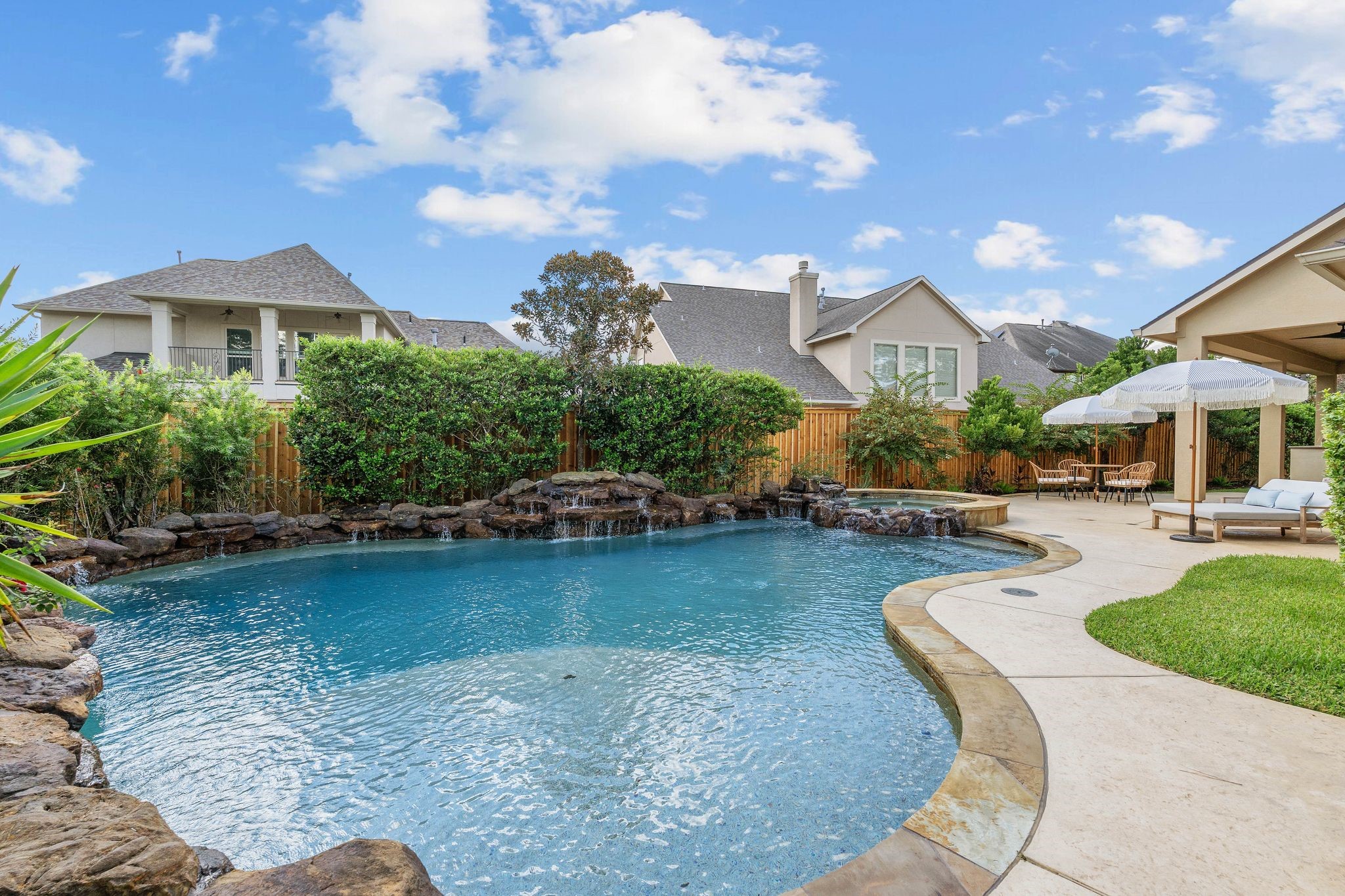 7603 Hogan Bridge Court Spring, TX 77389 - Photo 42 of 49 a view of a house with swimming pool and a yard