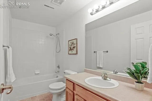 a bathroom with a sink toilet a tub and shower