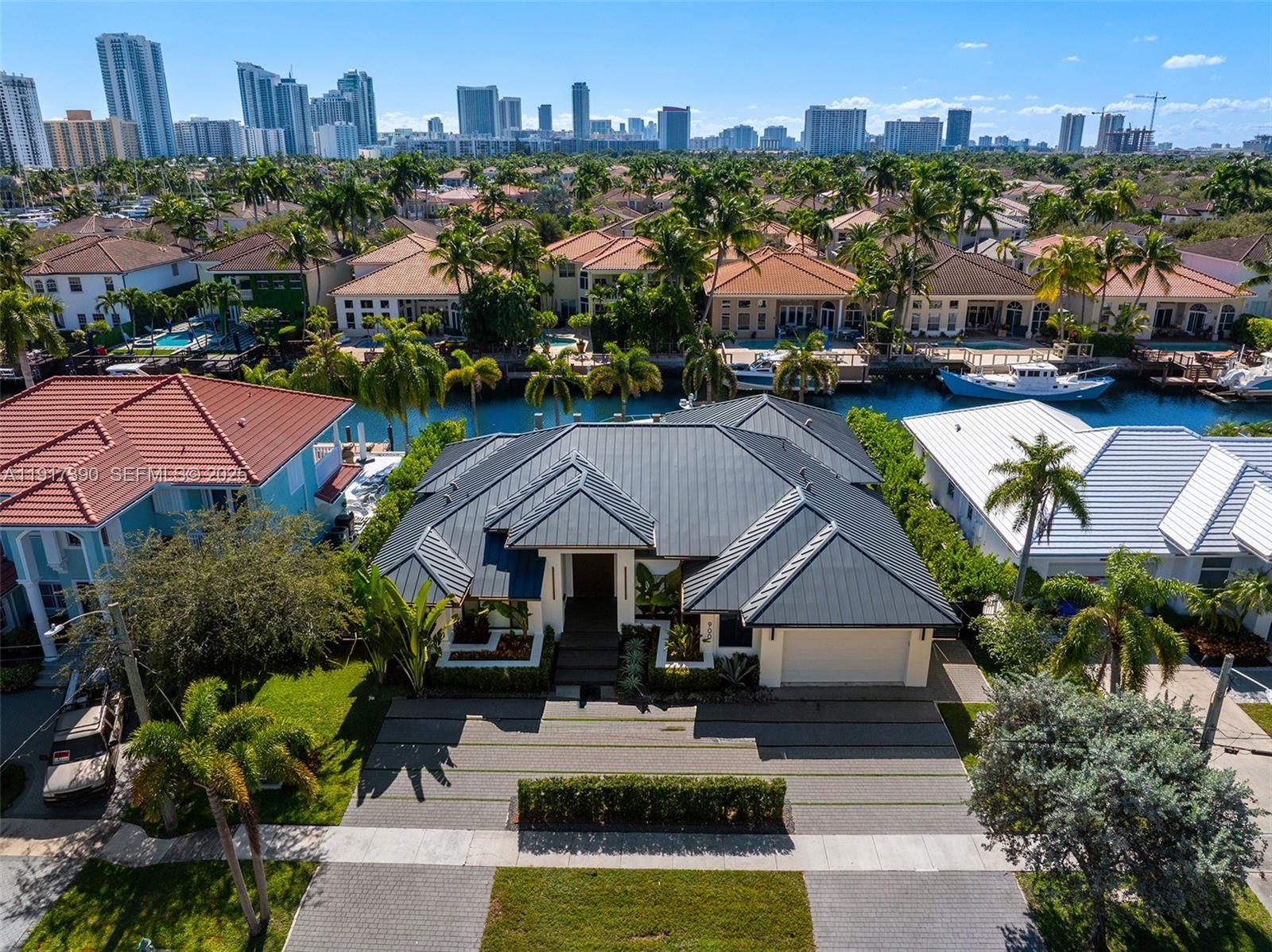 900 Washington Street Hollywood, FL 33019 - Photo 59 of 61 an aerial view of multiple houses with a yard