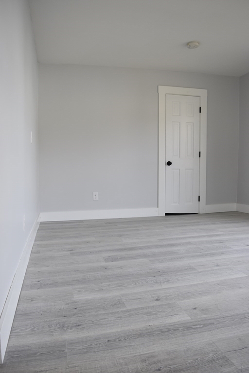 7 Pearl Street Southbridge, MA 01550 - Photo 16 of 41 a view of room with wooden floor
