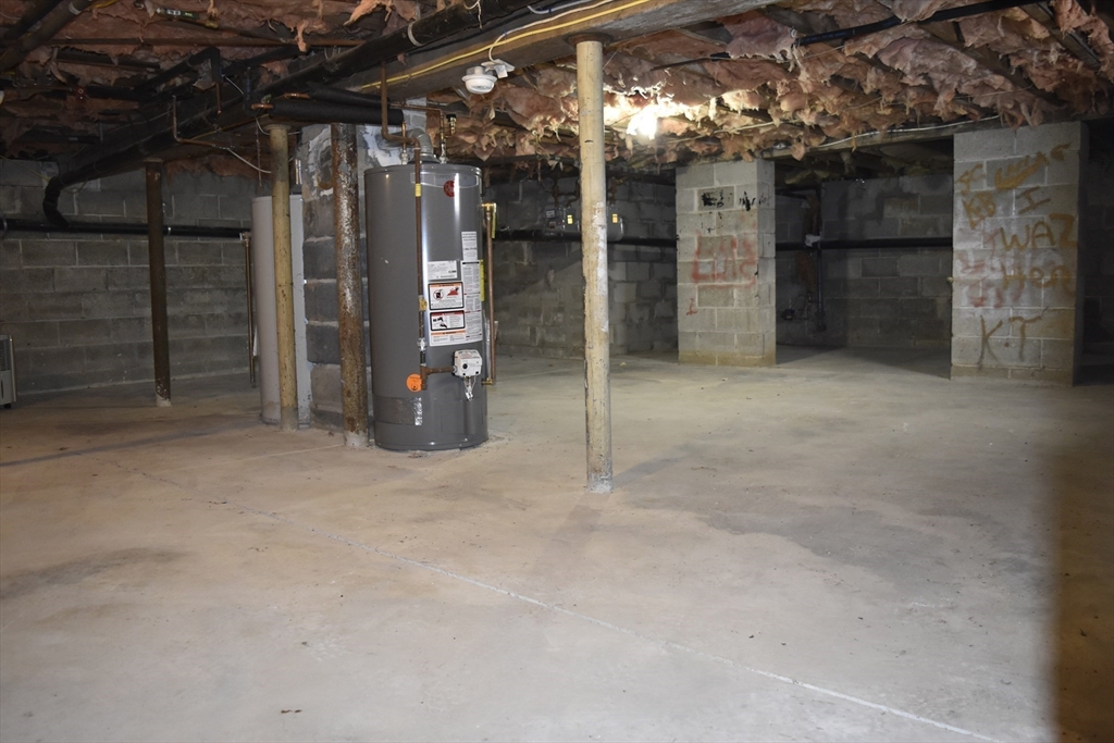 7 Pearl Street Southbridge, MA 01550 - Photo 33 of 41 a view of empty room with a fireplace