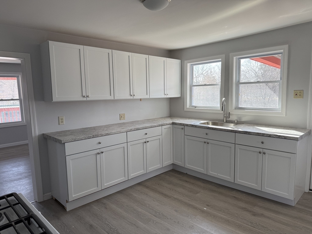 7 Pearl Street Southbridge, MA 01550 - Photo 4 of 41 a view of a kitchen sink cabinets and outdoor space