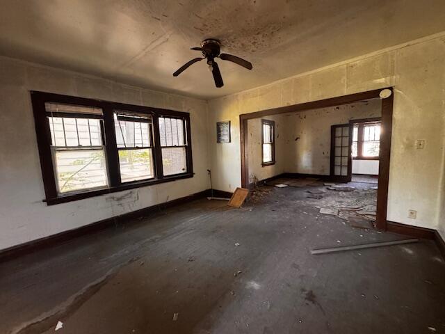709 Vermont Street Gary, IN 46402 - Photo 2 of 9 a view of livingroom with hardwood floor and a ceiling fan