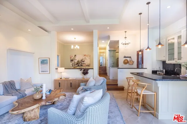 a large living room with a large window