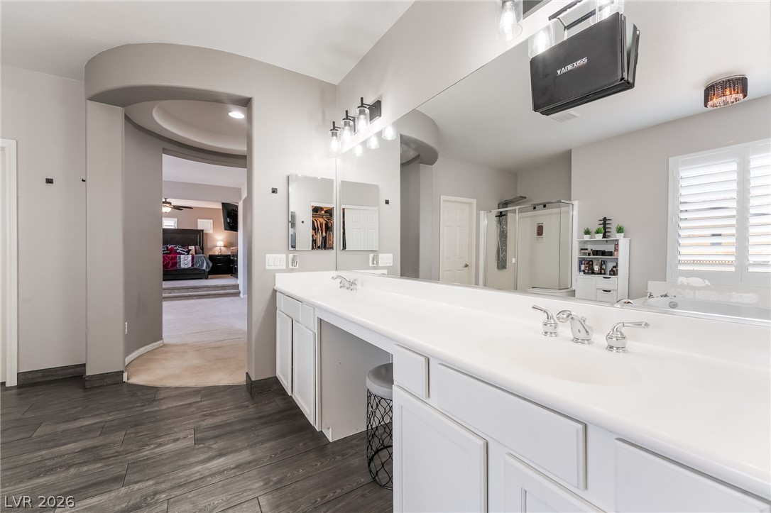 8358 Nelson Ridge Lane Las Vegas, NV 89178 - Photo 23 of 43 A generous primary bathroom provides ample counter space and privacy with a separate commode.