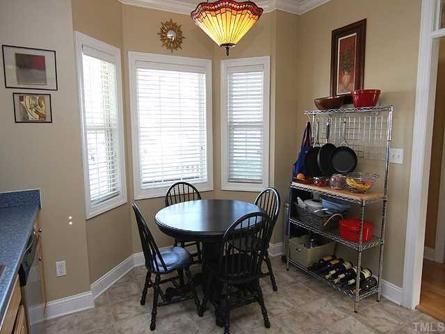 4824 Morning Edge Drive Raleigh, NC 27613 - Photo 6 of 12 a dining room with furniture and window