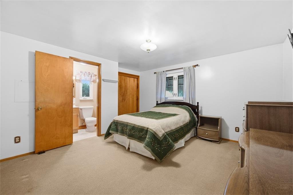 108 Starling Drive McKees Rocks, PA 15136 - Photo 12 of 37 a spacious bedroom with a bed and window