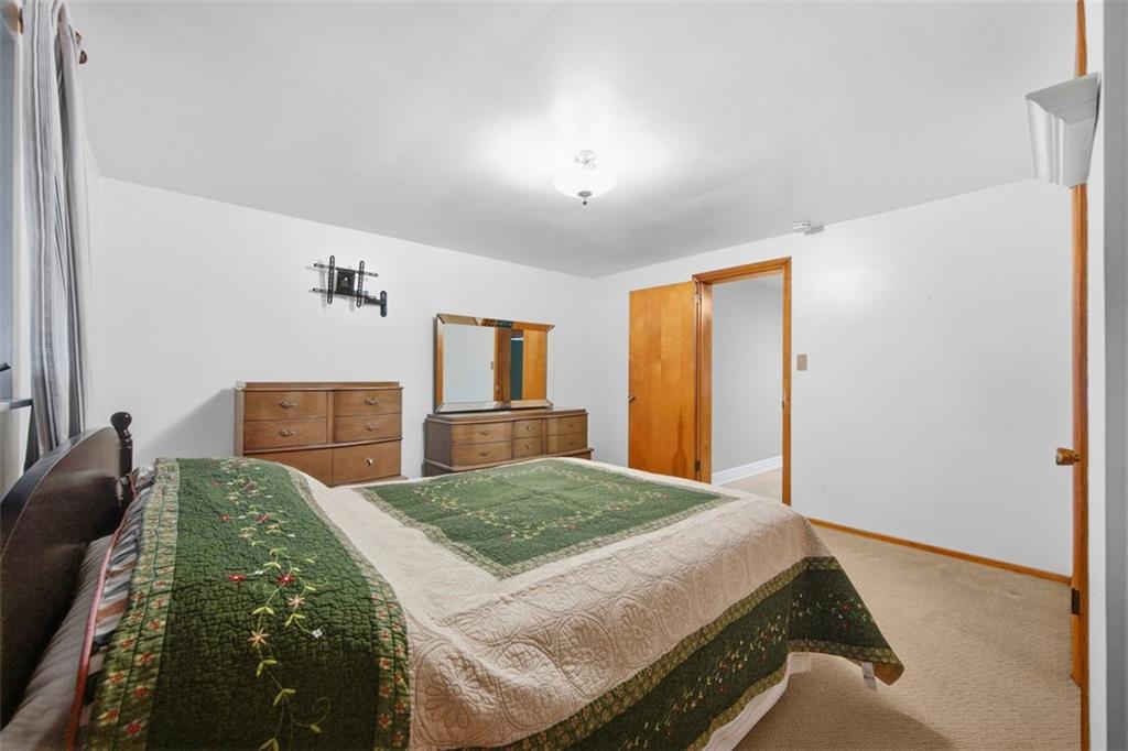 108 Starling Drive McKees Rocks, PA 15136 - Photo 14 of 37 a bedroom with a bed and a dresser