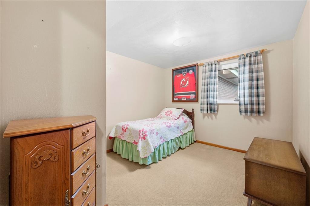 108 Starling Drive McKees Rocks, PA 15136 - Photo 17 of 37 a bedroom with a bed and a window