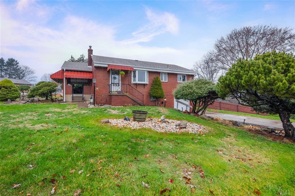 108 Starling Drive McKees Rocks, PA 15136 - Photo 2 of 37 a front view of house with yard and green space