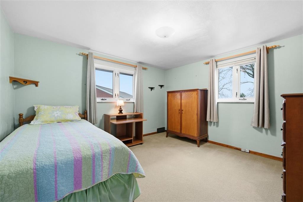 108 Starling Drive McKees Rocks, PA 15136 - Photo 21 of 37 a bedroom with a bed and a window