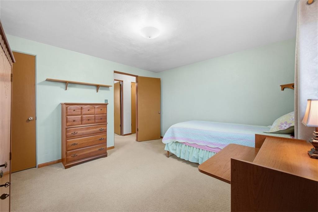 108 Starling Drive McKees Rocks, PA 15136 - Photo 22 of 37 a bedroom with a bed and a cabinets