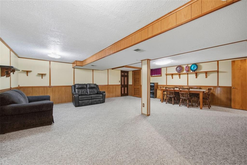 108 Starling Drive McKees Rocks, PA 15136 - Photo 26 of 37 a living room with furniture and a large window