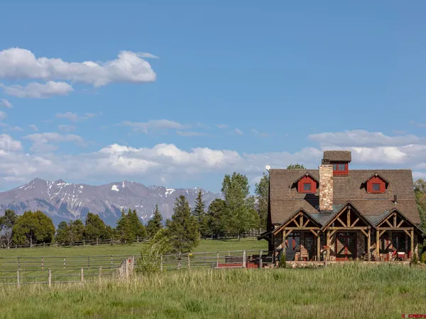 a view of an ocean with mountain in the background